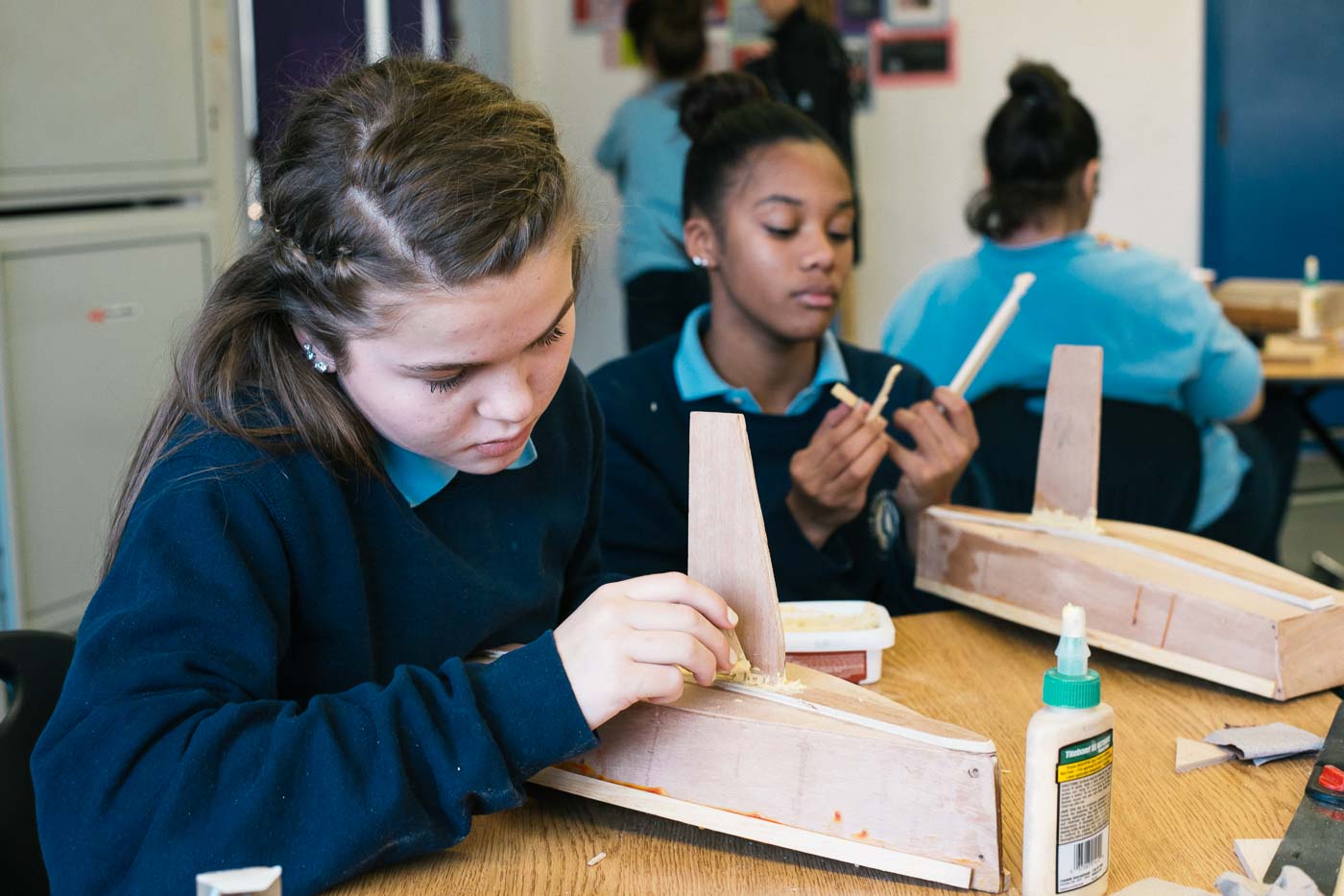 Our Sisters School gluing in their keels