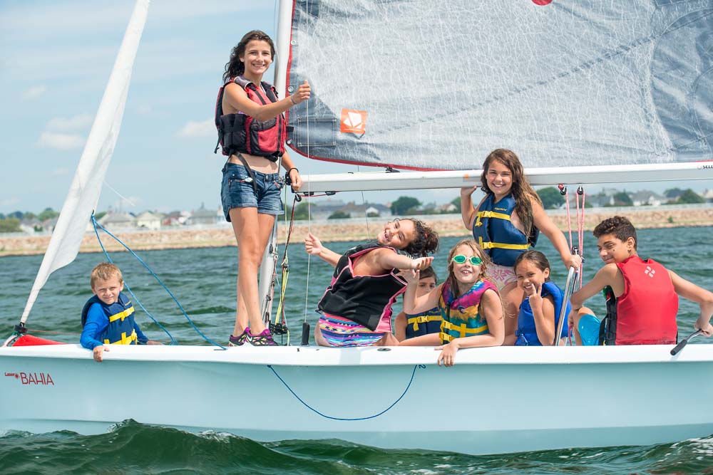 Instructors and students sailing a Bahia