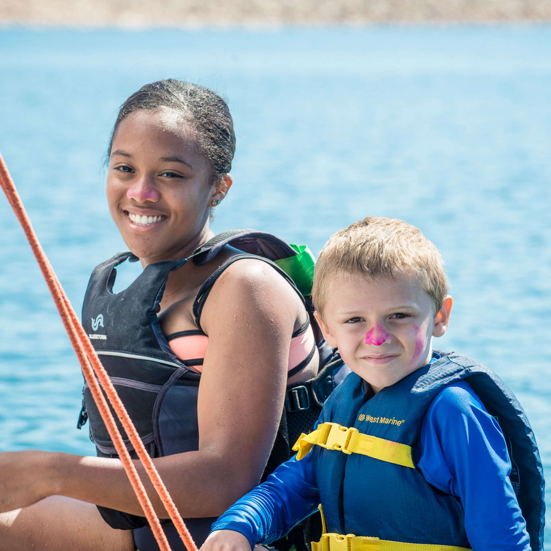 Student sailing a pico with instructor