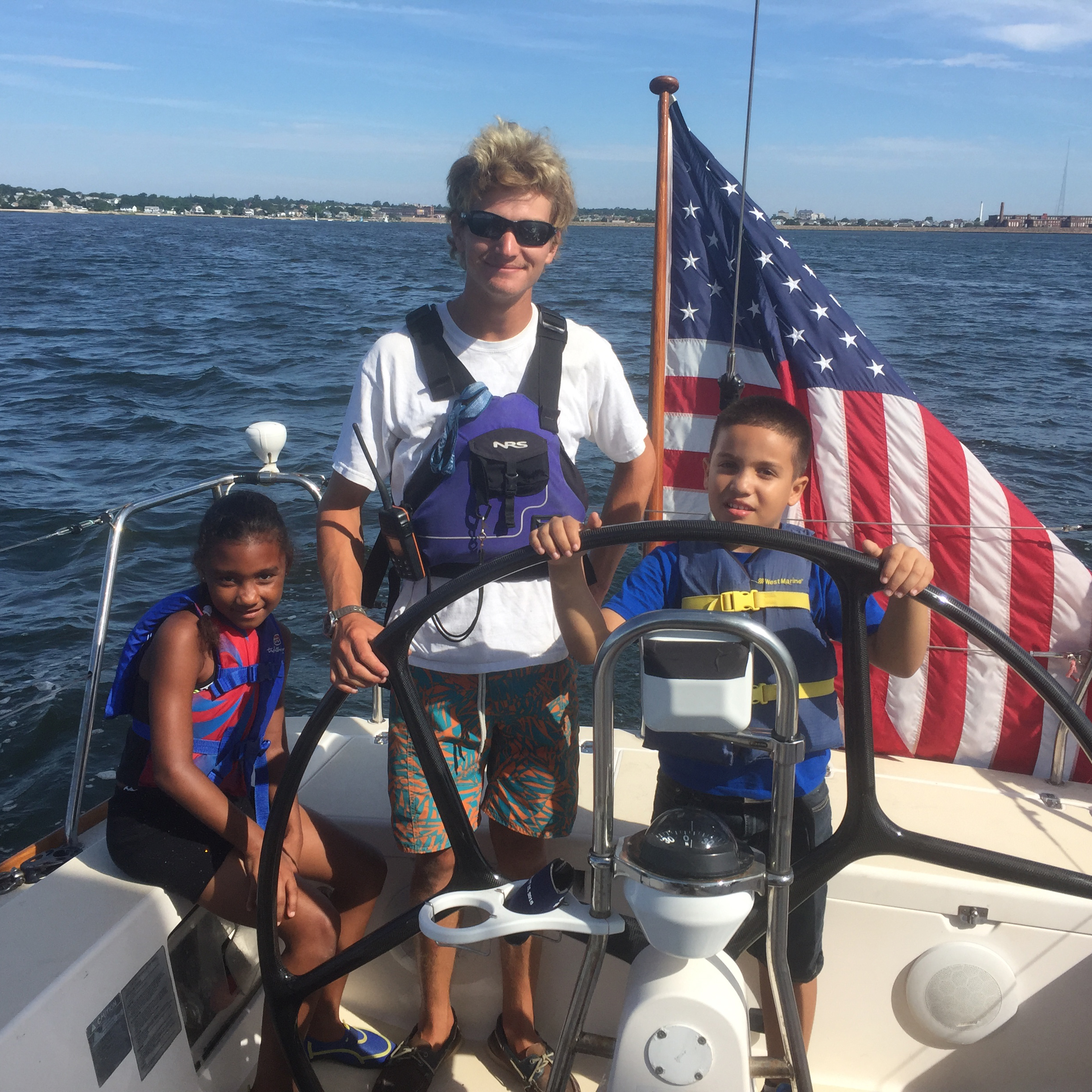 Taber Russell and Students sailing a keelboat
