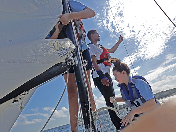 Students rigging up a sonar