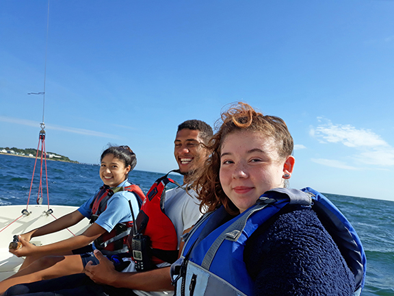 Students and instructor sailing on a sonar