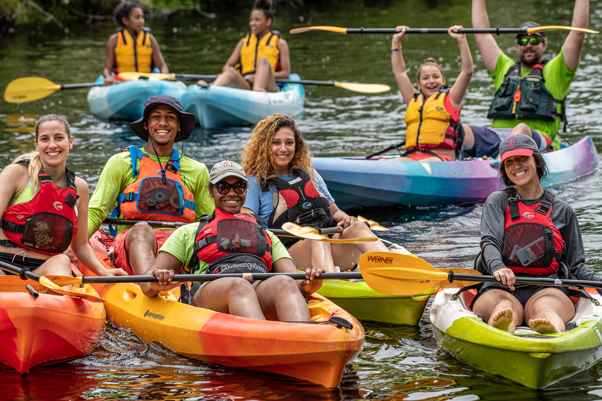 instructors and students on kayaks