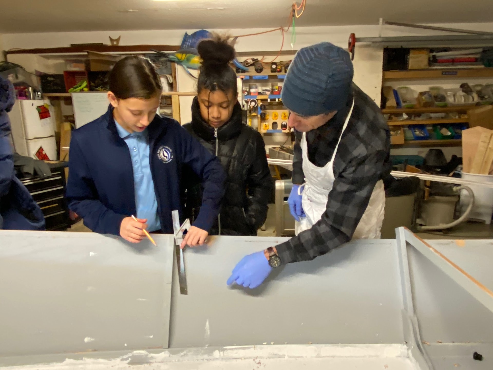 Wooden boat building with students