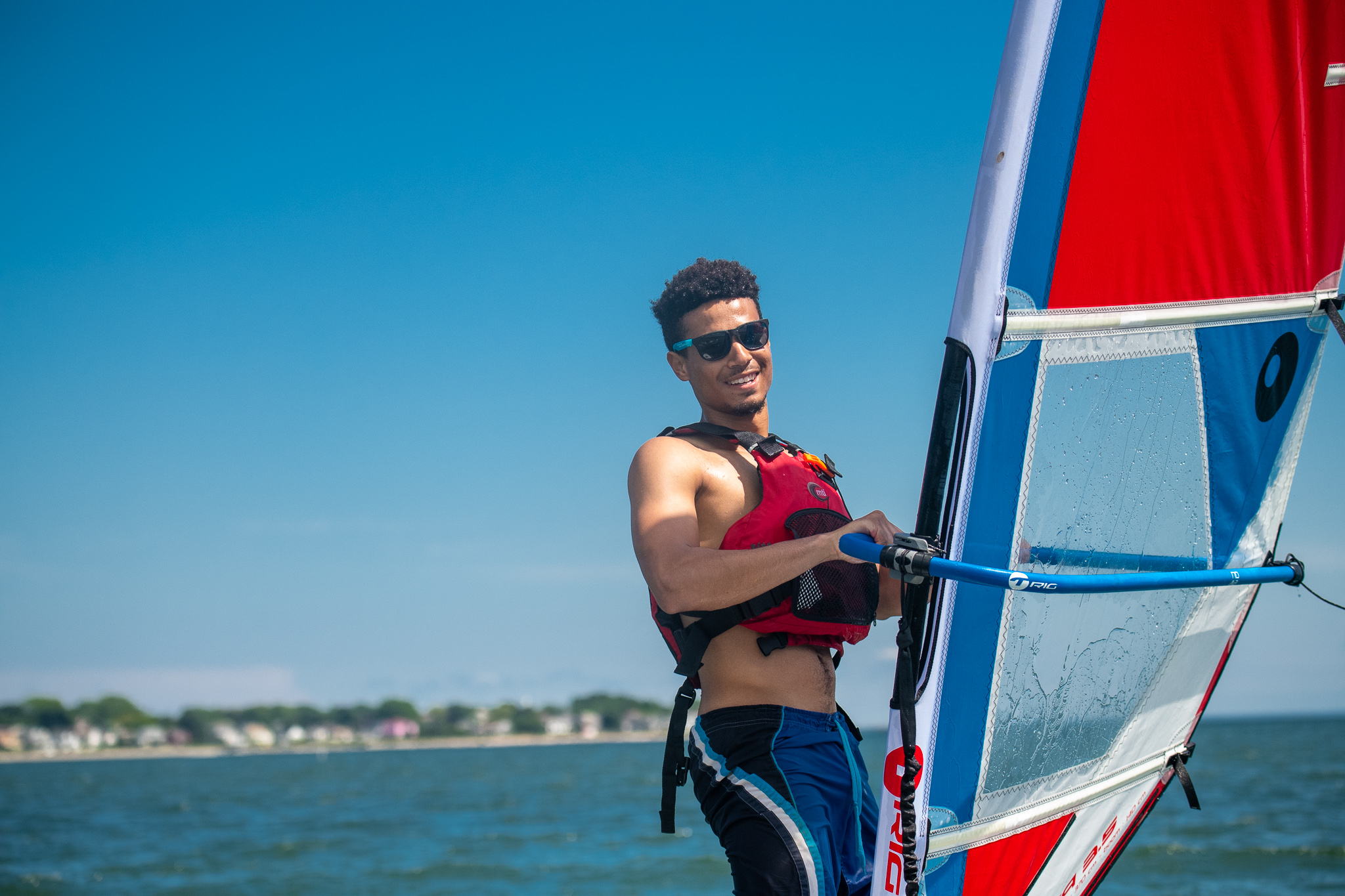 Instructor sailing a windsurfer