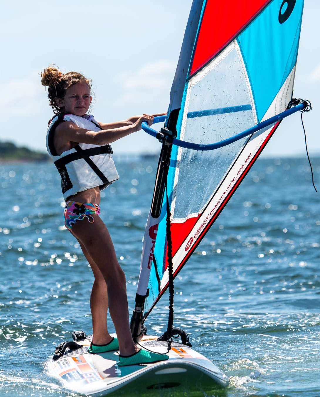student sailing on wind surf