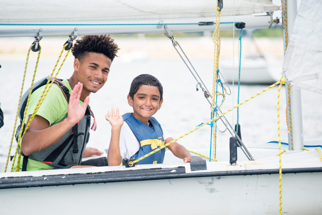 Instructor and student sailing a 420